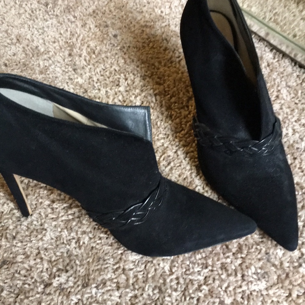 Alexandre Birman black suede shoes.